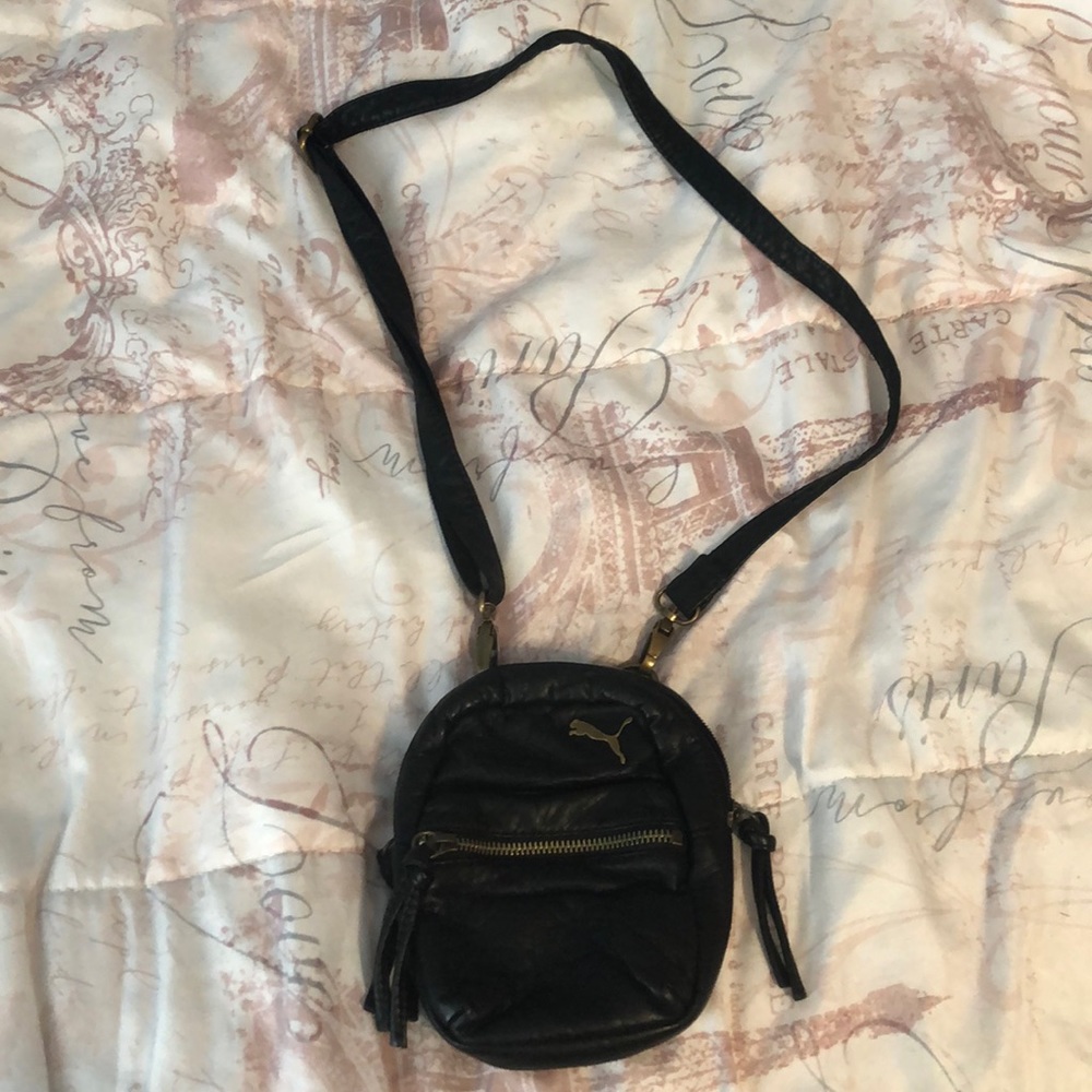 A small puma miniature backpack/ side purse
